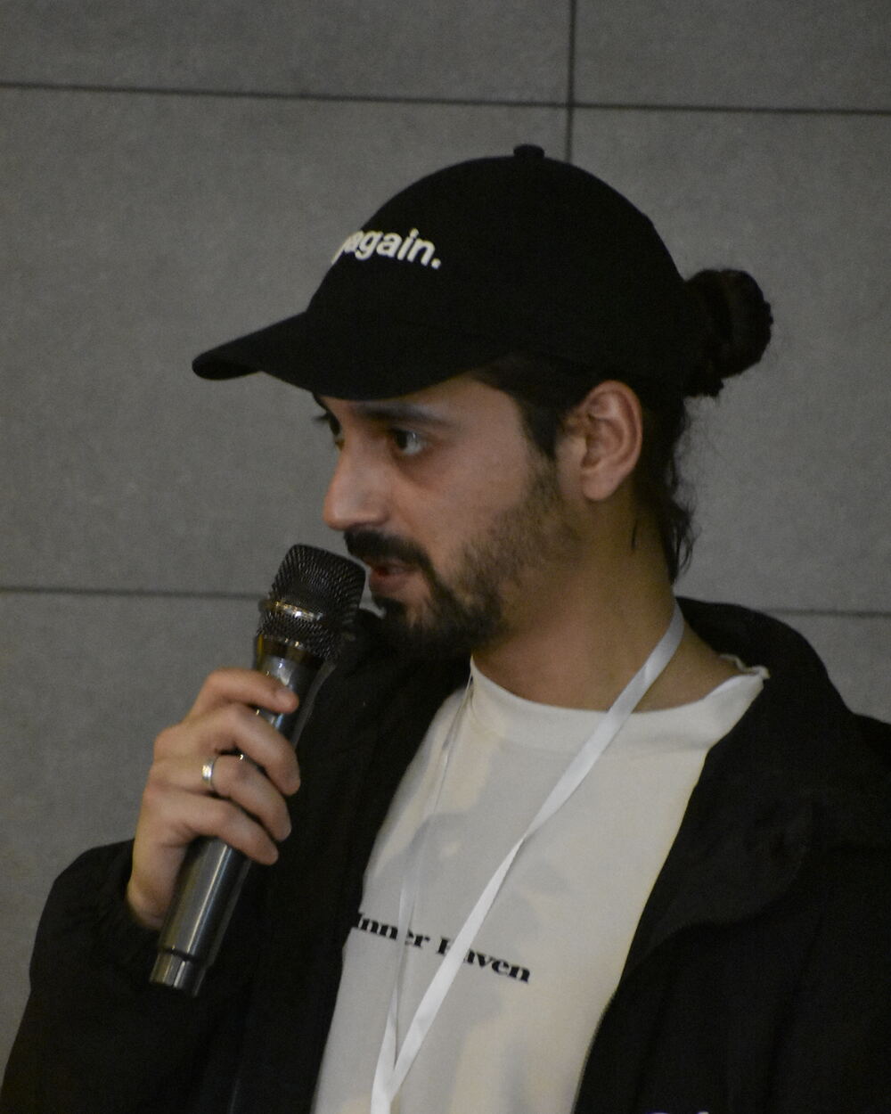 Raslem Charmati speaking during a workshop session